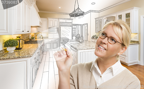 Image of Woman With Pencil Over Custom Kitchen Drawing and Photo Combinat