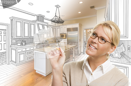 Image of Woman With Pencil Over Custom Kitchen Drawing and Photo Combinat