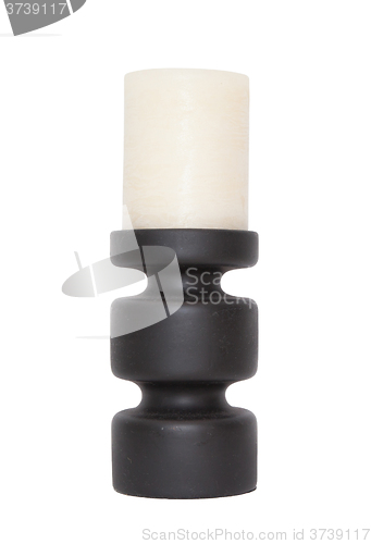 Image of Dirty candle holder with white candle in it isolated