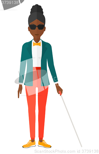 Image of Blind woman with stick.