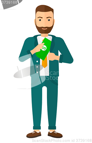 Image of Man putting money in pocket.