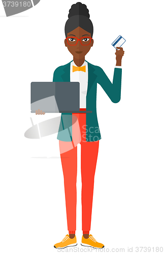 Image of Woman making purchases online.