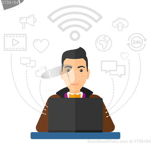Image of Man working on laptop.