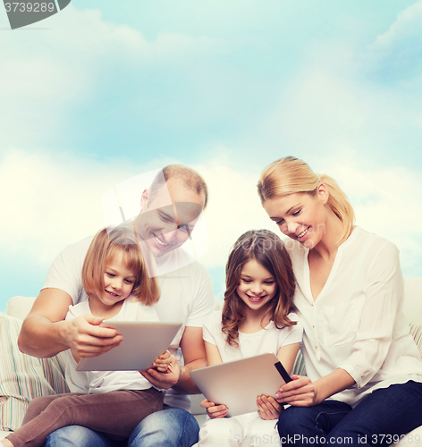 Image of happy family with tablet pc computers