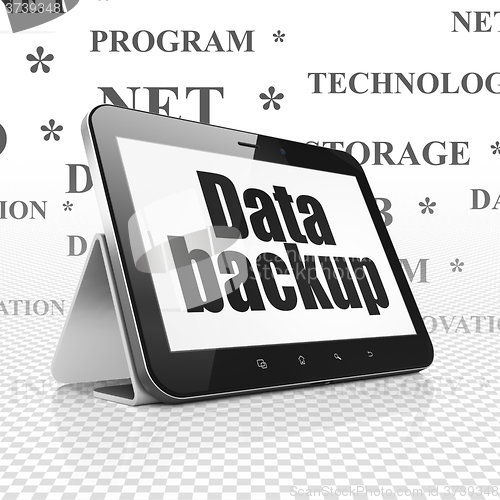 Image of Data concept: Tablet Computer with Data Backup on display