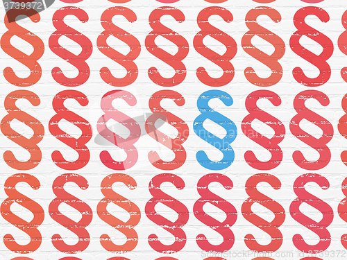 Image of Law concept: paragraph icon on wall background
