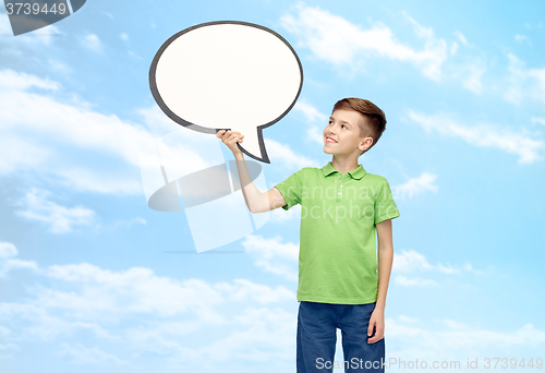 Image of happy boy holding blank white text bubble banner