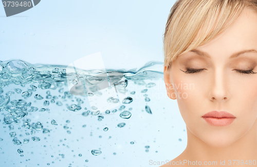 Image of young woman face with closed eyes