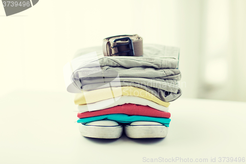 Image of close up of clothes and accessories on table