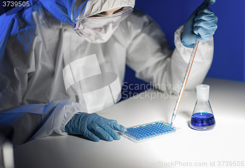 Image of close up of scientist making test in lab