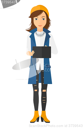 Image of Woman using tablet computer.