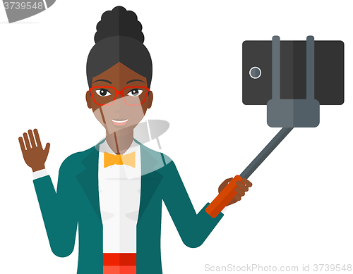 Image of Woman making selfie.