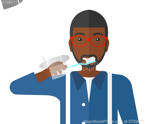 Image of Man brushing teeth.