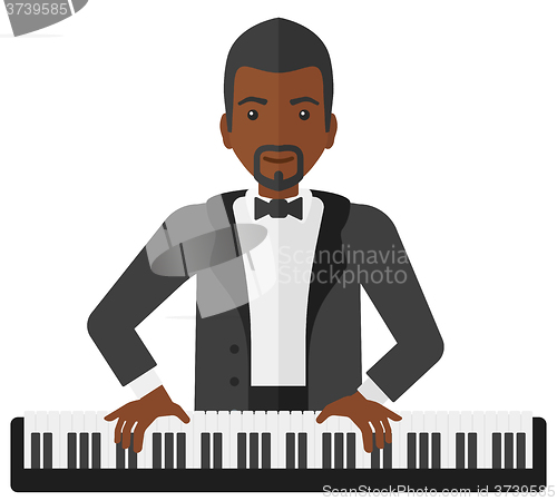 Image of Man playing piano.