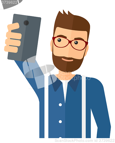 Image of Man making selfie.