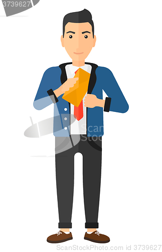Image of Man putting envelope in pocket.