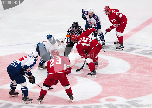 Image of Roman Horak (15) and Dmitry Semin (42) on face-off