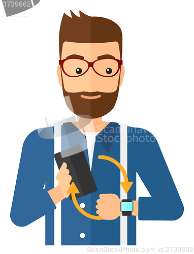 Image of Synchronization of smartphone and smartwatch.