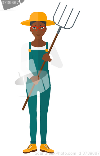 Image of Farmer with pitchfork.