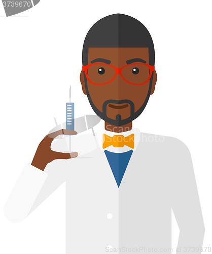 Image of Doctor holding syringe.