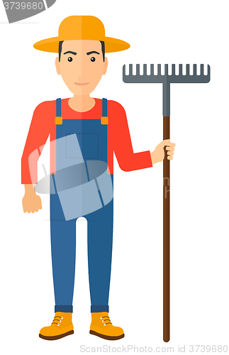 Image of Farmer with rake.