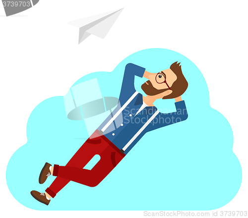 Image of Businessman relaxing on cloud.