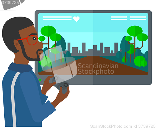 Image of Man playing video game.