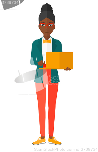 Image of Woman using laptop.