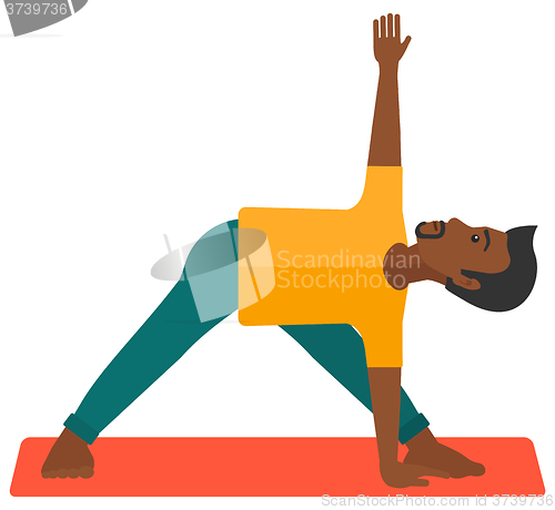 Image of Man practicing yoga.