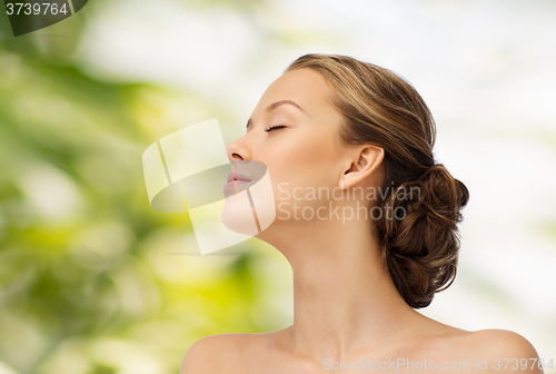 Image of young woman face and shoulders