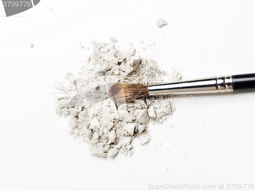 Image of close up of makeup brush and eyeshadow