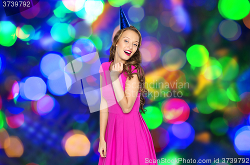 Image of happy young woman or teen girl in party cap