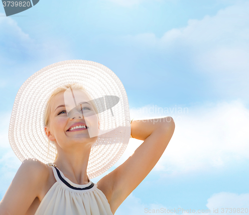 Image of beautiful woman enjoying summer outdoors