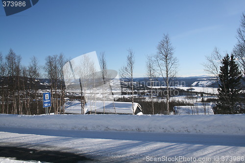 Image of Mountain road and tourist information sign