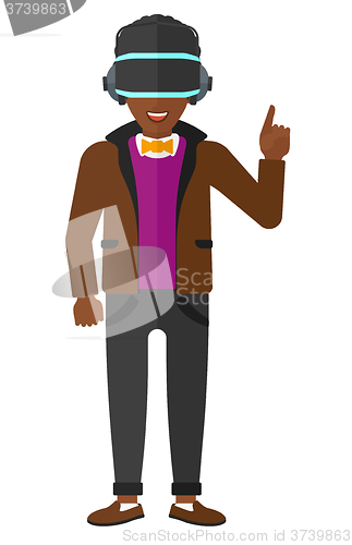 Image of Man wearing virtual reality headset.