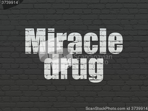 Image of Health concept: Miracle Drug on wall background