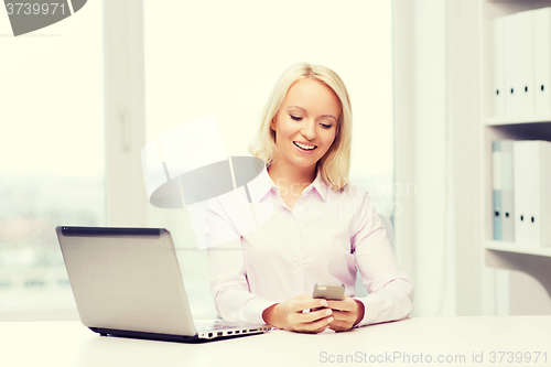 Image of smiling businesswoman or student with smartphone