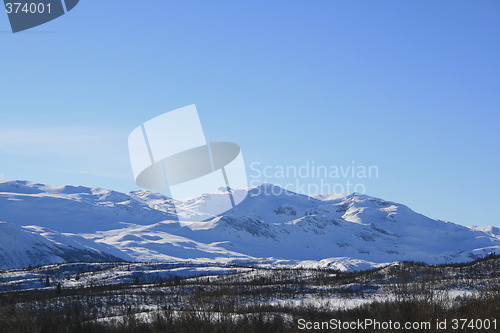 Image of snow covered mountains in Valdres