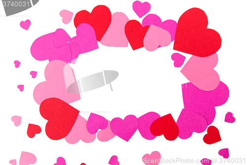 Image of close up of red and pink heart shapes in frame