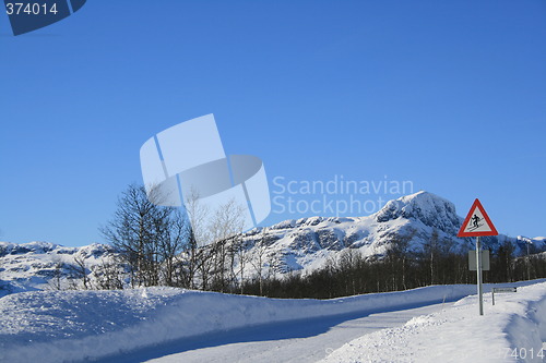 Image of Bitihorn and mountain road in winter