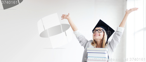 Image of happy student in graduation cap