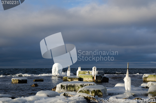 Image of Ice covered fence posts