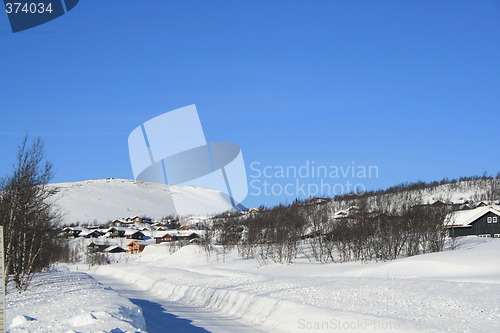 Image of Norwegian mountain cabins in winter