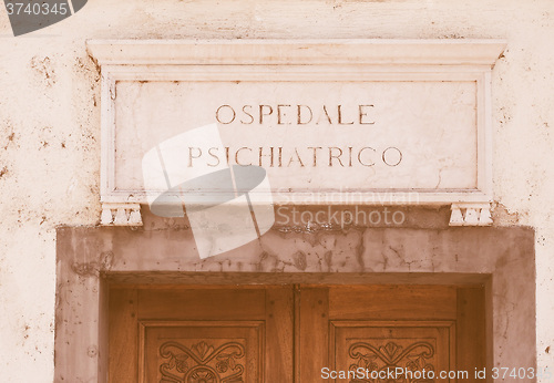 Image of Retro looking Italian mental hospital sign