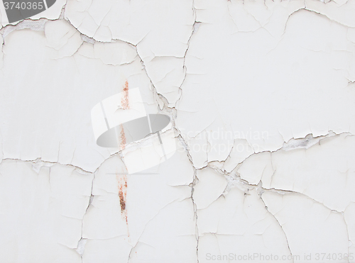 Image of White wall with cracks