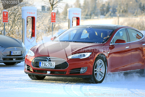 Image of Two Tesla Model S Electric Cars in Winter