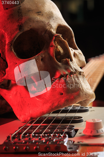 Image of Still life with skull and electric guitar