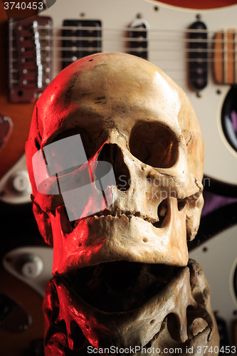 Image of Still life with skull and electric guitar