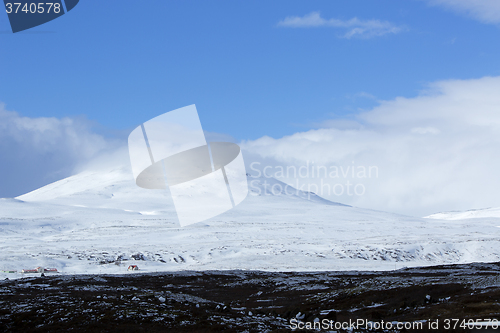 Image of Snowy mountain landscape, Iceland