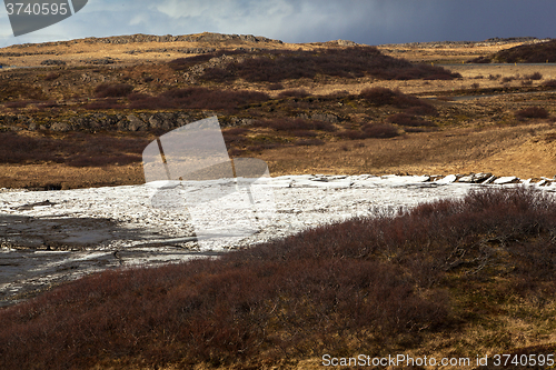 Image of Ice melting on a river bank, Iceland